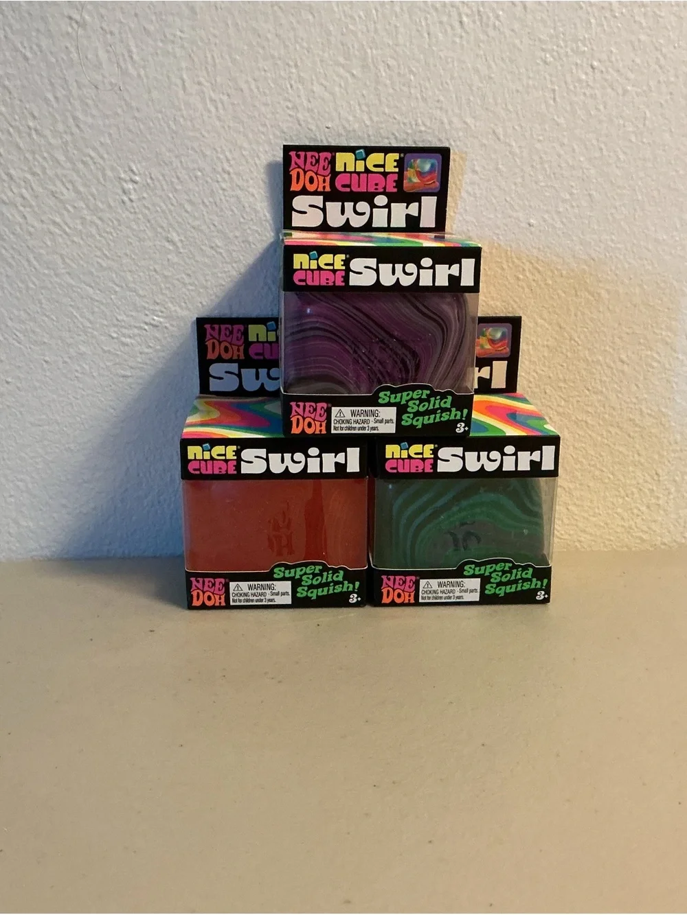 NeeDoh Swirl Super Solid Squish Cube - Purple, Red, Green